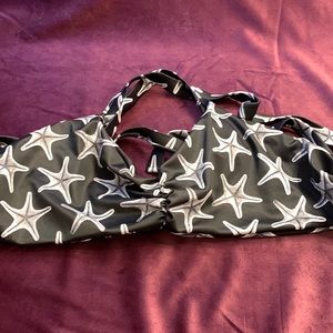 Large bikini top black and white star fish. Fused